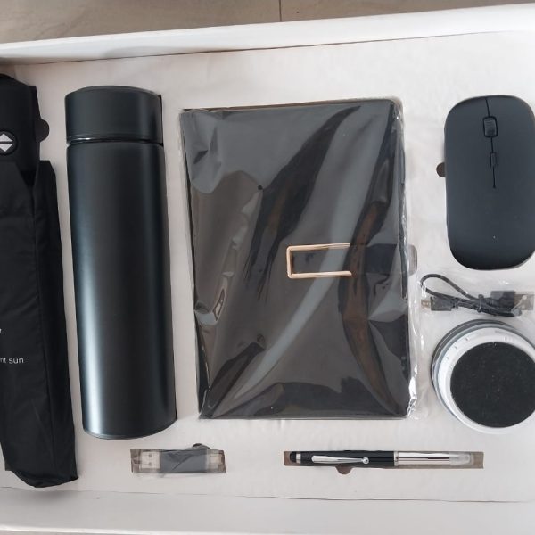 Premium 7 in 1 corporate gift set of ·         Umbrella ·         Bottle flask ·         Wireless mouse ·         Leather Notepad ·          Bluetooth speaker ·          Flash drive ·         Ball Pen ·         All in a well packaged box Readily available in stock -MOQ-50pcs   Consists 1 Hot/Cold Temperature Vacuum Flask , 1 Executive Pen 1 Bluetooth speaker 1 Wireless Mouse 1 16gb flash drive 1 diary/notepad , 1 umbrella . Colours Available: Black , Blue , Gold . Item available in large quantities . Branding/ Customization services also available